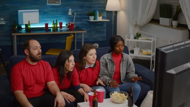 A photograph of a family gathered around a television set in a cozy living room, watching a live sports event. The image emphasizes the community aspect and shared experience of watching network TV.