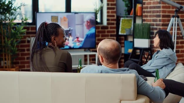 A behind-the-scenes shot of a diverse writing team collaborating on a cable TV show. The room is filled with scripts and storyboards, and the team members appear to be engaged in a lively discussion. The image highlights the importance of diverse voices in creating authentic representation.
