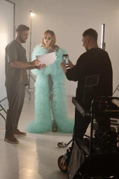 A behind-the-scenes photo from the set of a popular cable original series, showing the cast and crew at work, highlighting the high production value and creative effort involved in these shows.