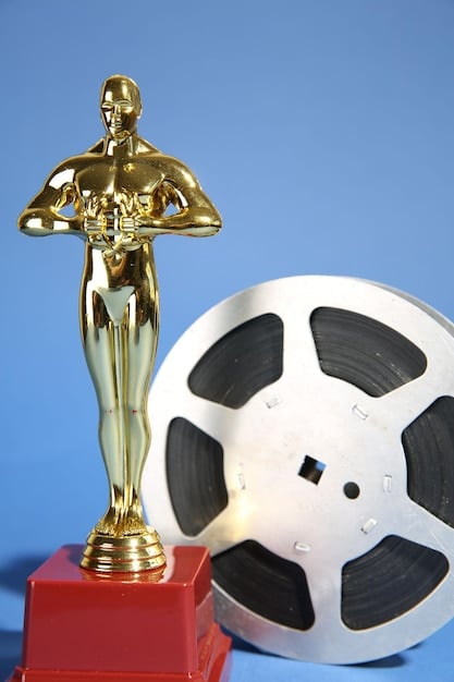 An image featuring various awards (Emmys, Golden Globes) that cable original series have won, symbolizing the critical acclaim and recognition they have received in the television industry.