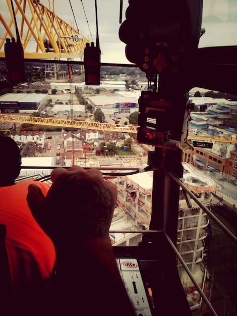 A behind-the-scenes shot of an international co-production filming on location in a bustling foreign city. The image shows a diverse crew working together, highlighting the collaborative nature of these projects.