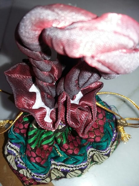 A detailed close-up shot of the costume design from a Masterpiece Limited Series adaptation of a classic novel, such as 